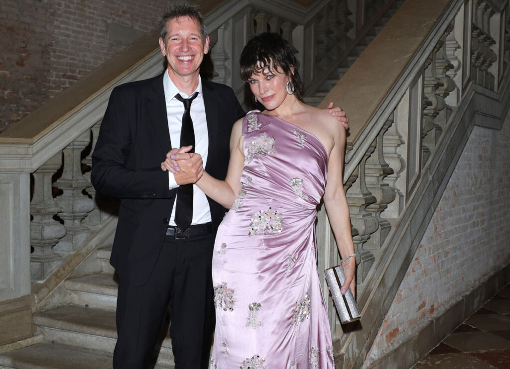 VENICE, ITALY - SEPTEMBER 03: Paul Anderson and Milla Jovovich attend Miu Miu Women's Tales Dinner during the 80th Venice International Film Festival at Fondazione Prada on September 03, 2023 in Venice, Italy. (Photo by Jacopo M. Raule/Getty Images for Miu Miu)